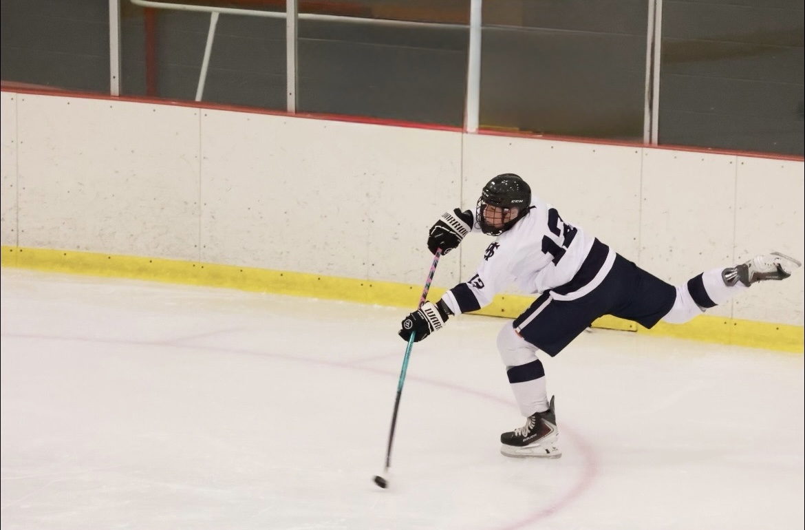 Hockey athlete competing